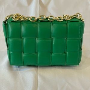 Green weave handbag with gold chain hardware